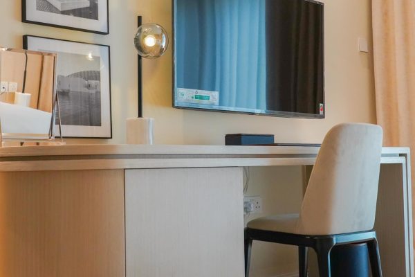 TV and Arm Chair in Andalus By Al Seef Resort and Spa